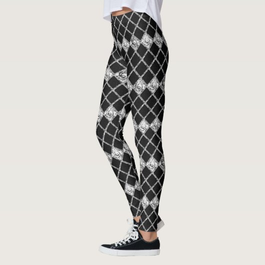 zwart wit controlepatroon leggings (Links)