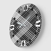 Zwart-wit en grijs verweven strepen op een grote klok (Hoek)