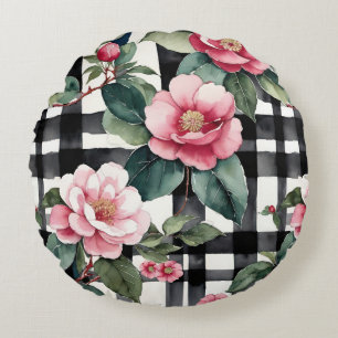 Zwart-wit geplakt met bladerige roze camelia's rond kussen