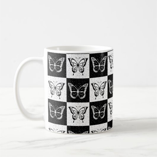 Zwart wit geruit vlinderontwerp koffiemok (Links)