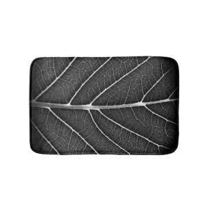 Zwart-wit gloeiend blad close-up badmat