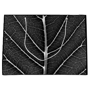 Zwart-wit gloeiend blad close-up groot cadeauzakje