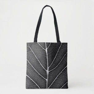 Zwart-wit gloeiend blad close-up tote bag