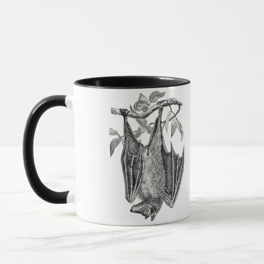 Zwart-wit hangende vleermuis Mok (Links)