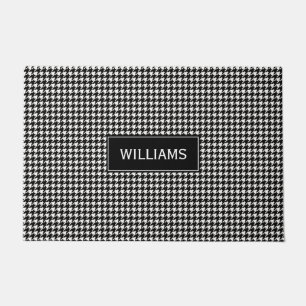 Zwart-wit houndstooth-patroonpatroon deurmat