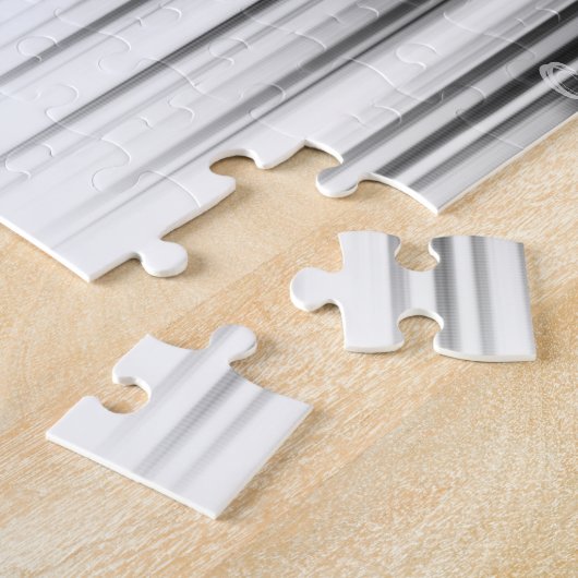 Zwart-wit hypnotische cirkelvormige lijn strepen k legpuzzel (Zijkant)