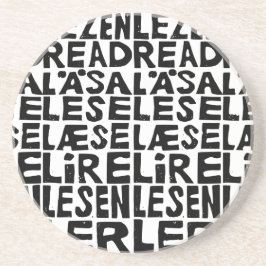 Zwart-wit "Lees" in 8 Talen Lino Cut Zandsteen Onderzetter