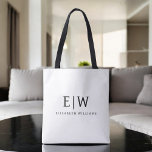 Zwart-wit Minimalistisch Modern Monogram Tote Bag<br><div class="desc">Introductie van ons Black and White Minimalist Modern Monogram-Collectie: omarm eenvoud en verfijning met onze minimalistische design, samengesteld om uw stijl moeiteloos te verbeteren. Dit collectie is gemaakt met een scherp oog voor moderne esthetiek en heeft strakke zwart-witte design die worden geaccentueerd door gepersonaliseerde monogrammen. Van chique briefpapier tot veelzijdige...</div>