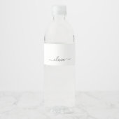 Zwart wit modern script meisjesmonogram naam waterfles etiket (Voorkant)