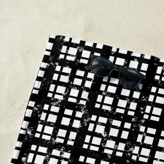 Zwart-wit Plaid met Paint Splatter Strandlaken (In situ)