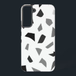 Zwart-wit terrazzo patroon samsung galaxy hoesje<br><div class="desc">Maak kennis met ons gestroomlijnde mobiele hoesje met een prachtig zwart-wit terrazzo-ontwerp. Dit stijlvolle accessoire combineert moderne elegantie met duurzaamheid en biedt een optimale bescherming voor uw apparaat. Het unieke gespikkelde patroon voegt een vleugje sophisticatie toe, waardoor het perfect is voor elke gelegenheid. Lichtgewicht en slank, het zorgt voor een...</div>