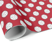 Zwart/wit volleybal ballen op donkerrood cadeaupapier (Rol Hoek)