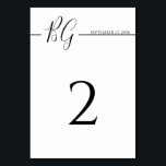 Zwart-witminimalistisch monogram huwelijk kaart<br><div class="desc">Dit ontwerp bevat een elegant zwart-wit minimalistisch monogram. De trouwdatum zit bovenop de lijn die de bruid en de bruidegom initialen groepeert. Zwart-wit script typografie bruiloft design. De combinatie van de zwarte en witte kleuren creëer een geavanceerde, trendy en chic stijl. Elegant het aantalontwerp van de trouwlijst met moderne elementen....</div>