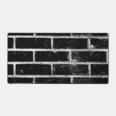 Zwart-witte bakmuur bureaumat (Voorkant)