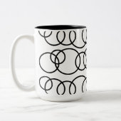 Zwart-witte cirkels bellenpatroon tweekleurige koffiemok (Links)