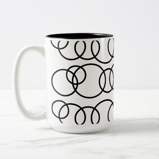 Zwart-witte cirkels bellenpatroon tweekleurige koffiemok (Links)