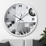 Zwart-witte deco-stijl wandklok<br><div class="desc">De klok van de muur met een playful kunstdecodesign in zwart-wit.</div>