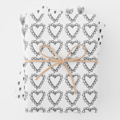 Zwart-witte doedelen harken schattig whimysisch pa inpakpapier vel (In situ)