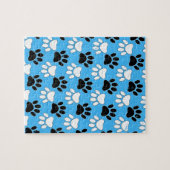 Zwart-witte en rode vlekken op blauwe achtergrond legpuzzel (Horizontaal)