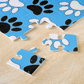 Zwart-witte en rode vlekken op blauwe achtergrond legpuzzel (Zijkant)