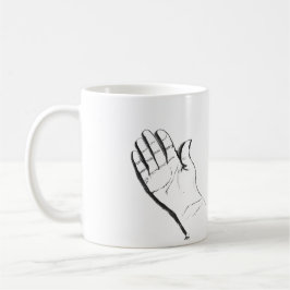zwart-witte hand op koffiemok