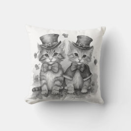 Zwart-witte katjes kussen