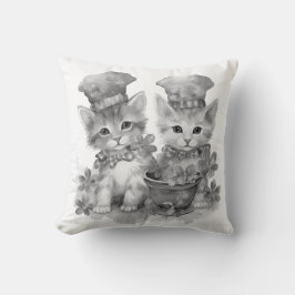 Zwart-witte katjes kussen