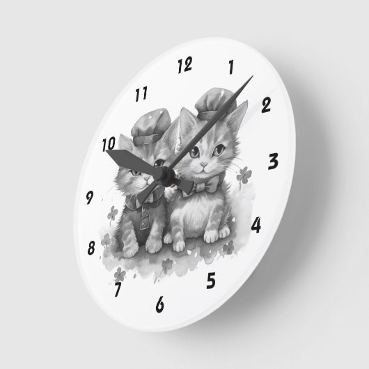 Zwart-witte kittens met strik stropdas en leuke pe ronde klok (Hoek)