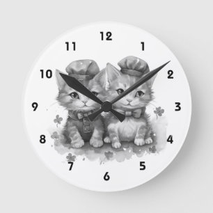 Zwart-witte kittens met strik stropdas en leuke pe ronde klok