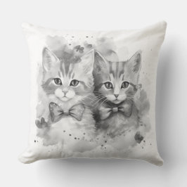 Zwart-witte kittens met strikken en vlinders kussen