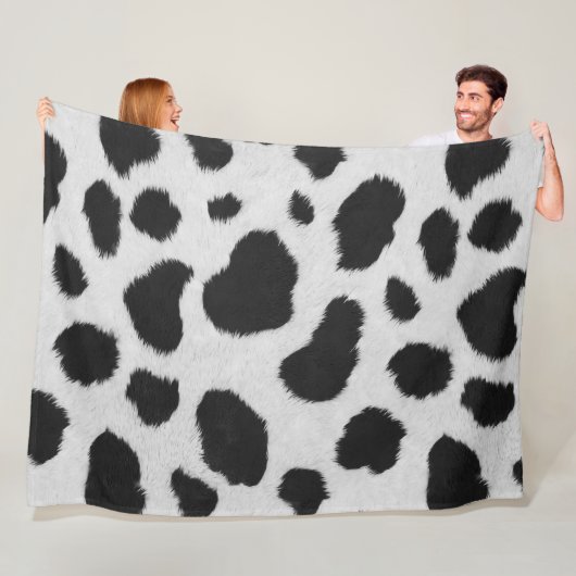 Zwart-witte koe bont patroon fleece deken (In situ)