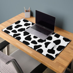 Zwart-witte koeienprint bureaumat