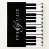 Zwart-witte pianosleutels, aangepaste naam monogra notitieboek (Achterkant)