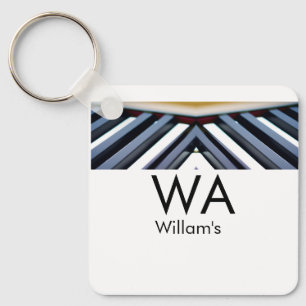 Zwart witte pianotoetsen voeg naam initiële letter sleutelhanger
