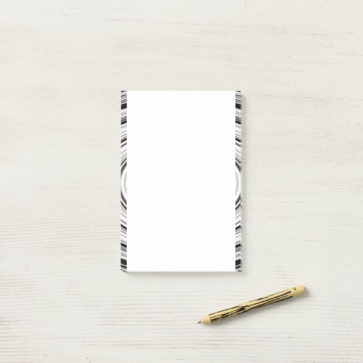 Zwart-witte spiraal post-it® notes (Op bureau)