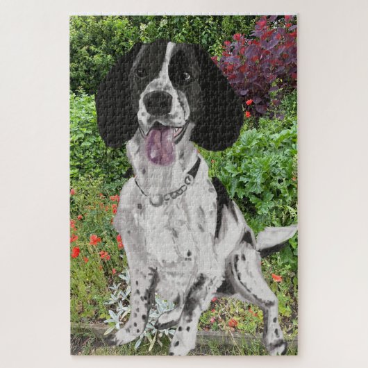 Zwart-witte Springer Spaniel tegen een bloem Legpuzzel (Verticaal)