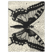 Zwart-witte vlinder op gekraakte achtergrond klembord (Achterkant)