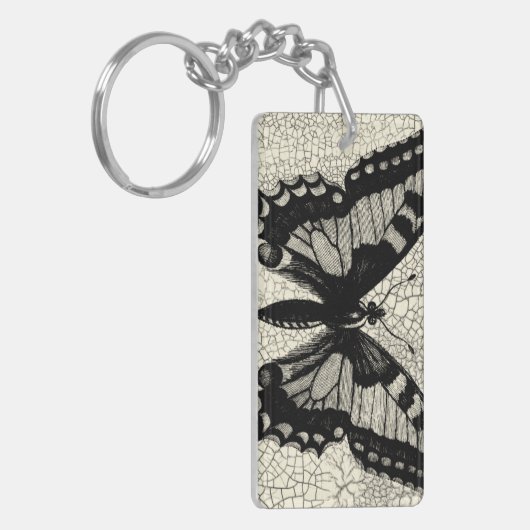 Zwart-witte vlinder op gekraakte achtergrond sleutelhanger (Voorkant Links)