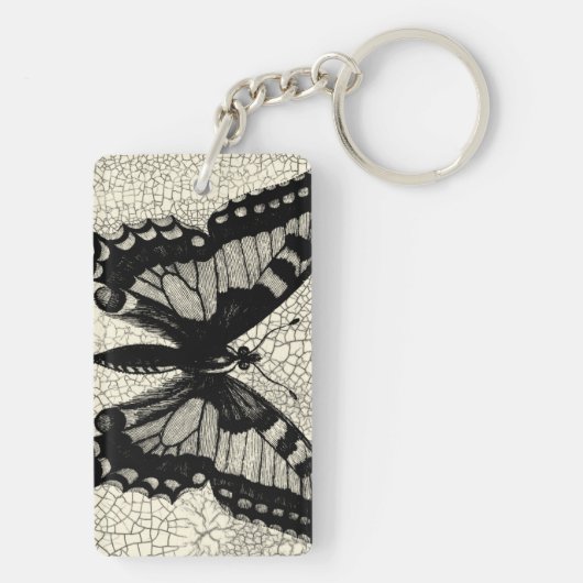 Zwart-witte vlinder op gekraakte achtergrond sleutelhanger (achterkant)