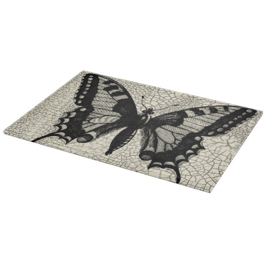 Zwart-witte vlinder op gekraakte achtergrond snijplank (Hoek)