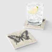 Zwart-witte vlinder op gekraakte achtergrond stenen onderzetter (Zijkant)