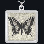 Zwart-witte vlinder op gekraakte achtergrond zilver vergulden ketting<br><div class="desc">Een eenvoudige zwarte en witte vlinder is de focus van deze afdruk door Vision Studio. Het twee-tonende insect en de gekraakte achtergrond geven het stuk een rustig gevoel. Bestel vandaag uw exemplaar!</div>