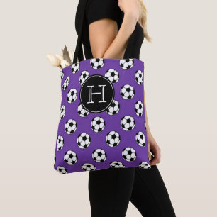 Zwart-witte voetballen op paars monogram tote bag