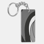 Zwart-witte vormkunst sleutelhanger (Voorkant Links)