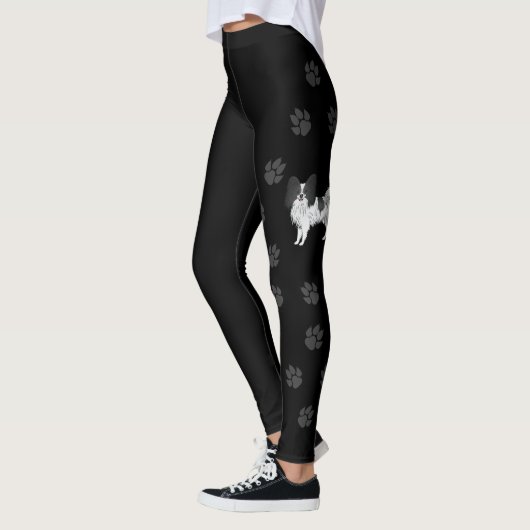 Zwart-wittekenfilmdoosje met poten leggings (Links)