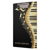 Zwarte achtergrond en gouden toetsenbord klembord (Links)