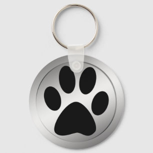 ZWARTE AFDRUKTE VAN DE PAW IN HET LIJST SILVER SLEUTELHANGER