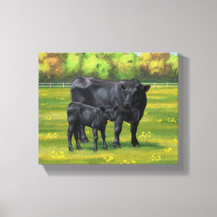 Zwarte Angus-Koe en Cute Calf in zomerperiode Canvas Afdruk