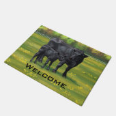 Zwarte Angus-Koe en Cute Calf in zomerperiode Deurmat (Schuin)