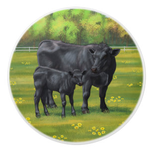 Zwarte Angus-Koe en Cute Calf in zomerperiode Keramische Knop
